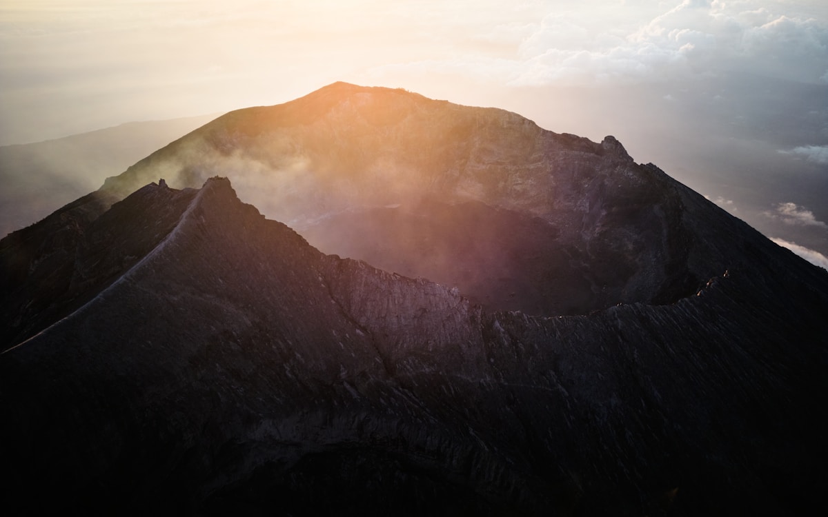 Mount Agung volcanic summit with crater at sunrise, Bali, Indonesia
