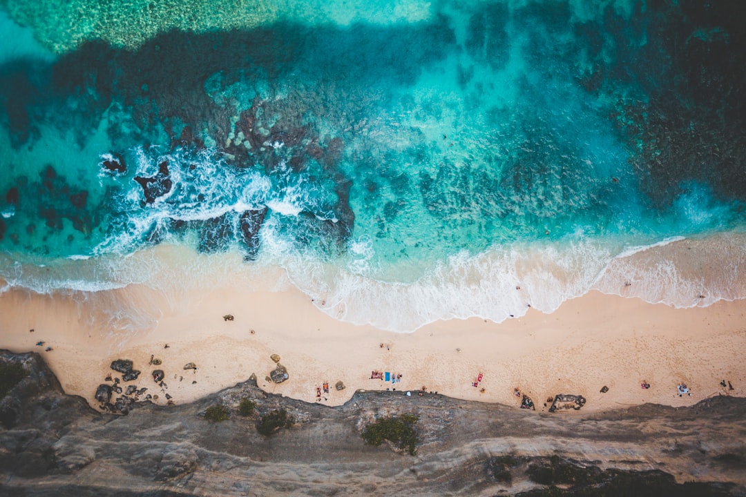 Aerial view of turquoise water and sandy beach from above, Nusa Penida, Bali, Indonesia