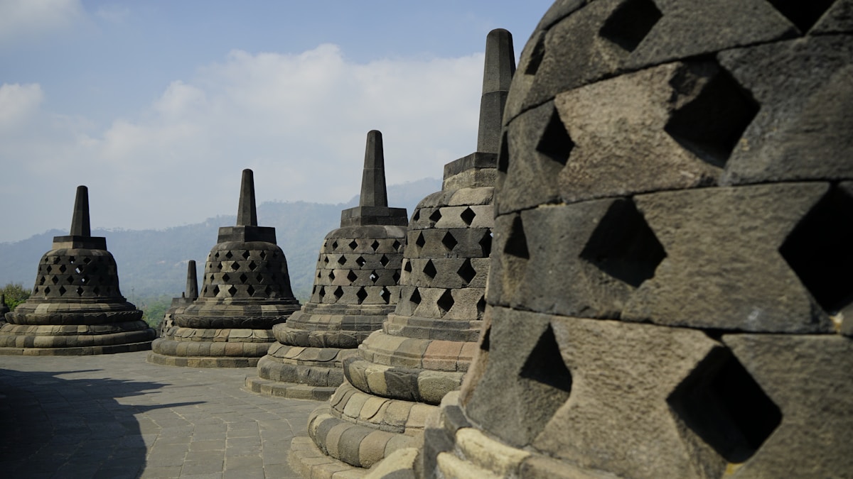 Stone carvings on a traditional Javanese temple at dawn