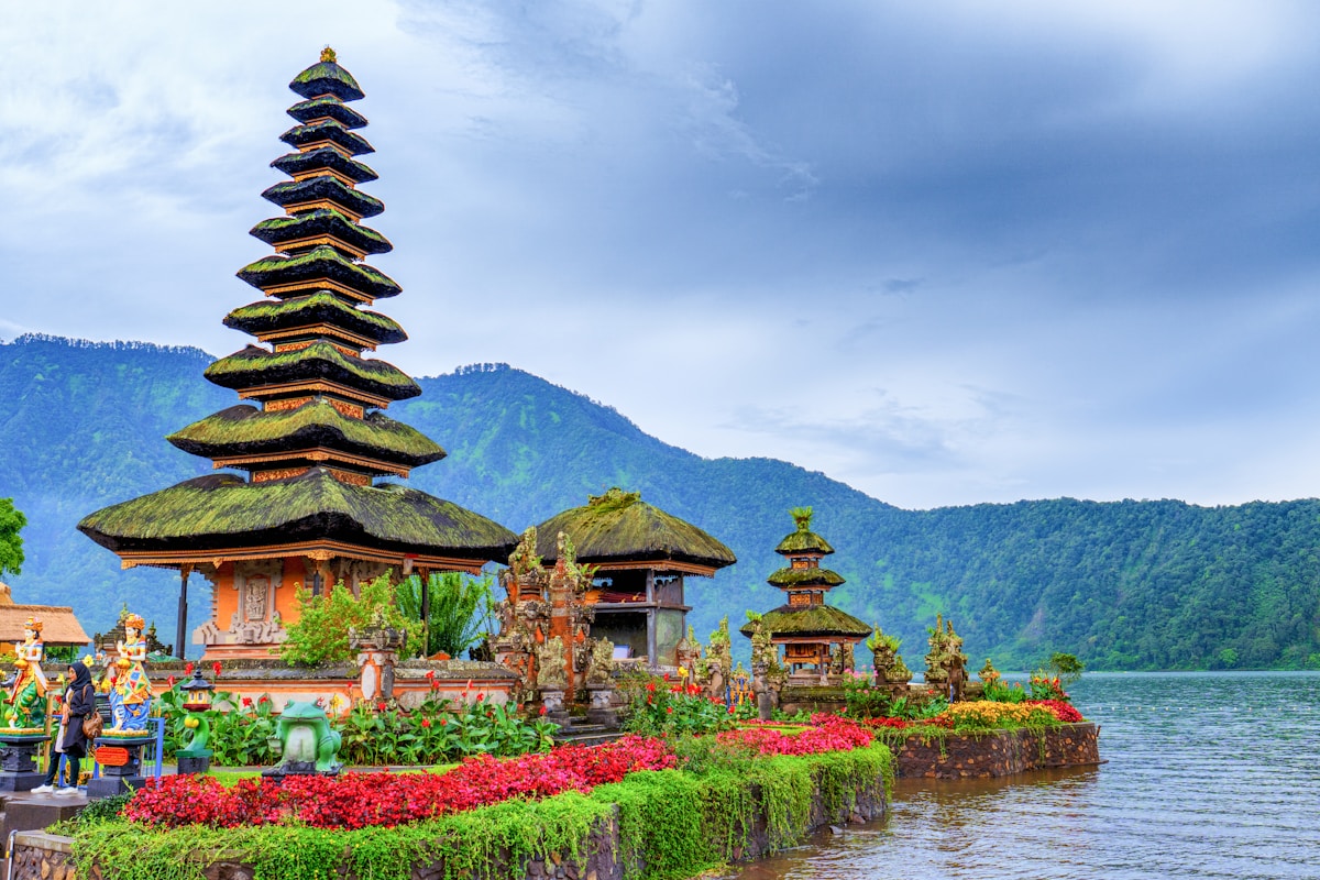 Balinese Hindu temple ceremony with offerings and incense, Bali