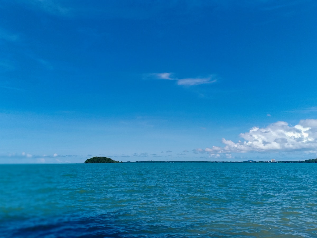 Small uninhabited island surrounded by clear turquoise sea, Belitung, Indonesia