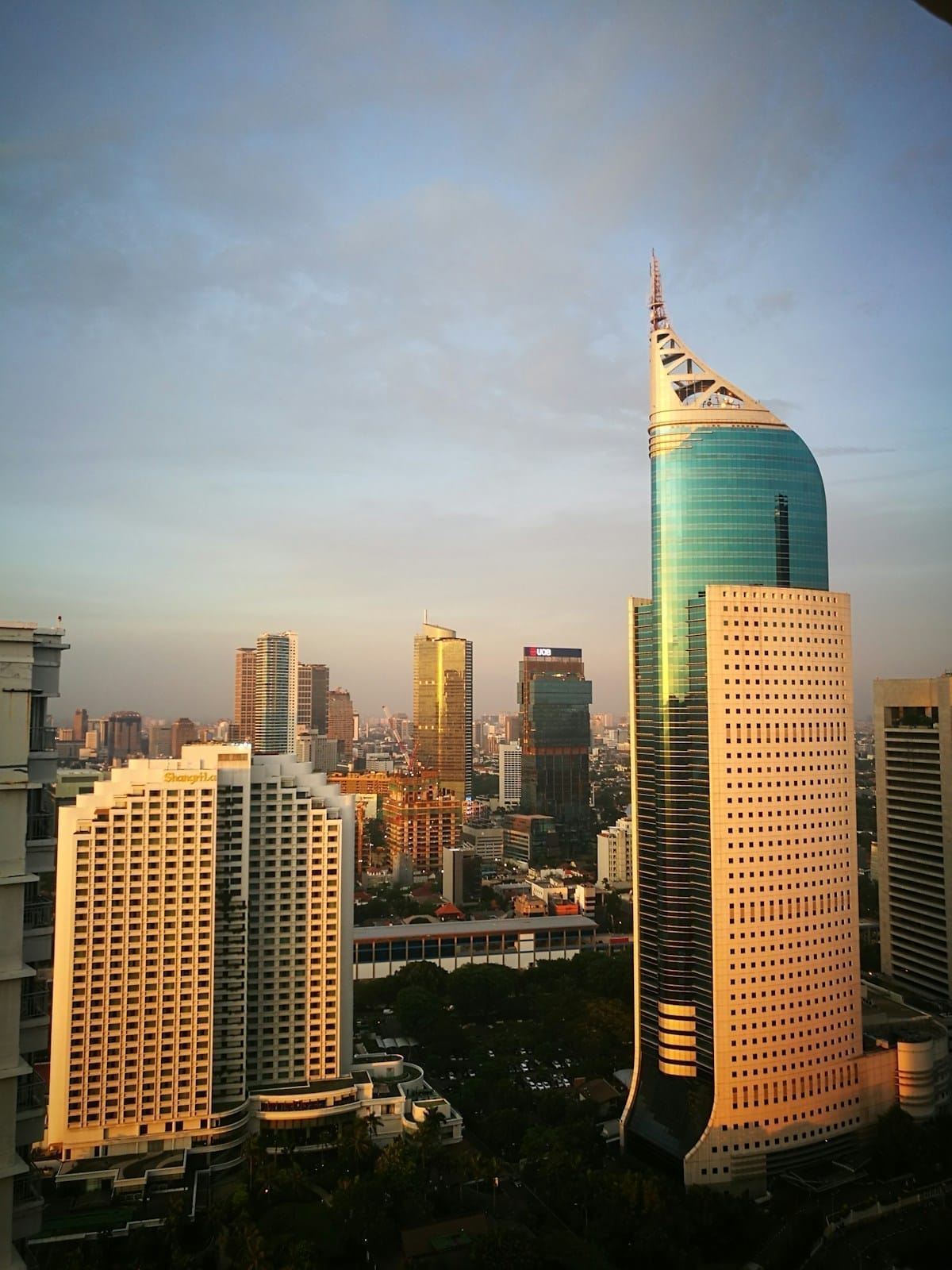 Gray high-rise hotel tower, Shangri-La area, Jakarta, Indonesia