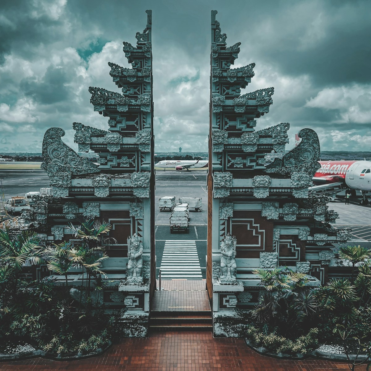 Airport gates next to a runway, Bali, Indonesia