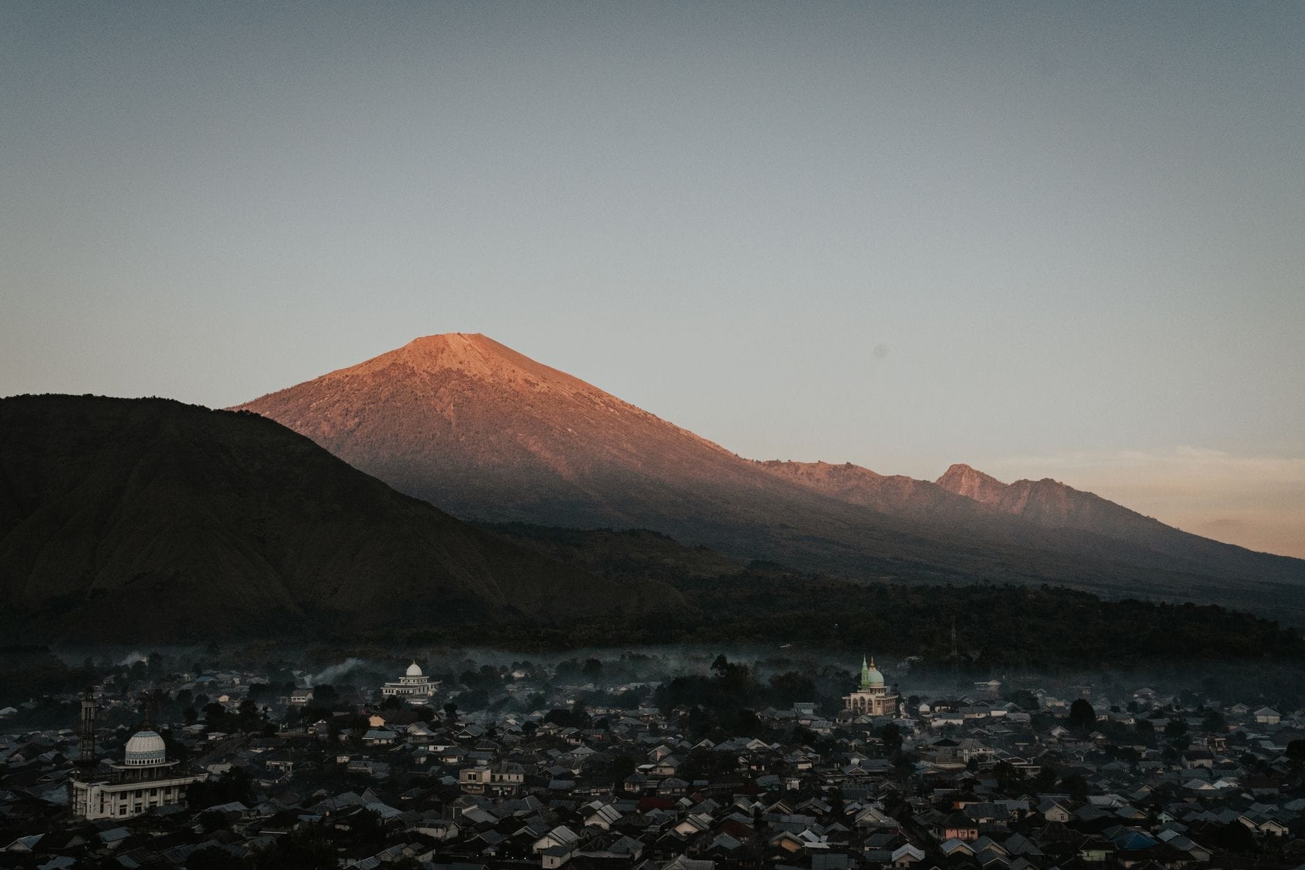 Sunrise over Mount Rinjani and village in West Nusa Tenggara, Indonesia