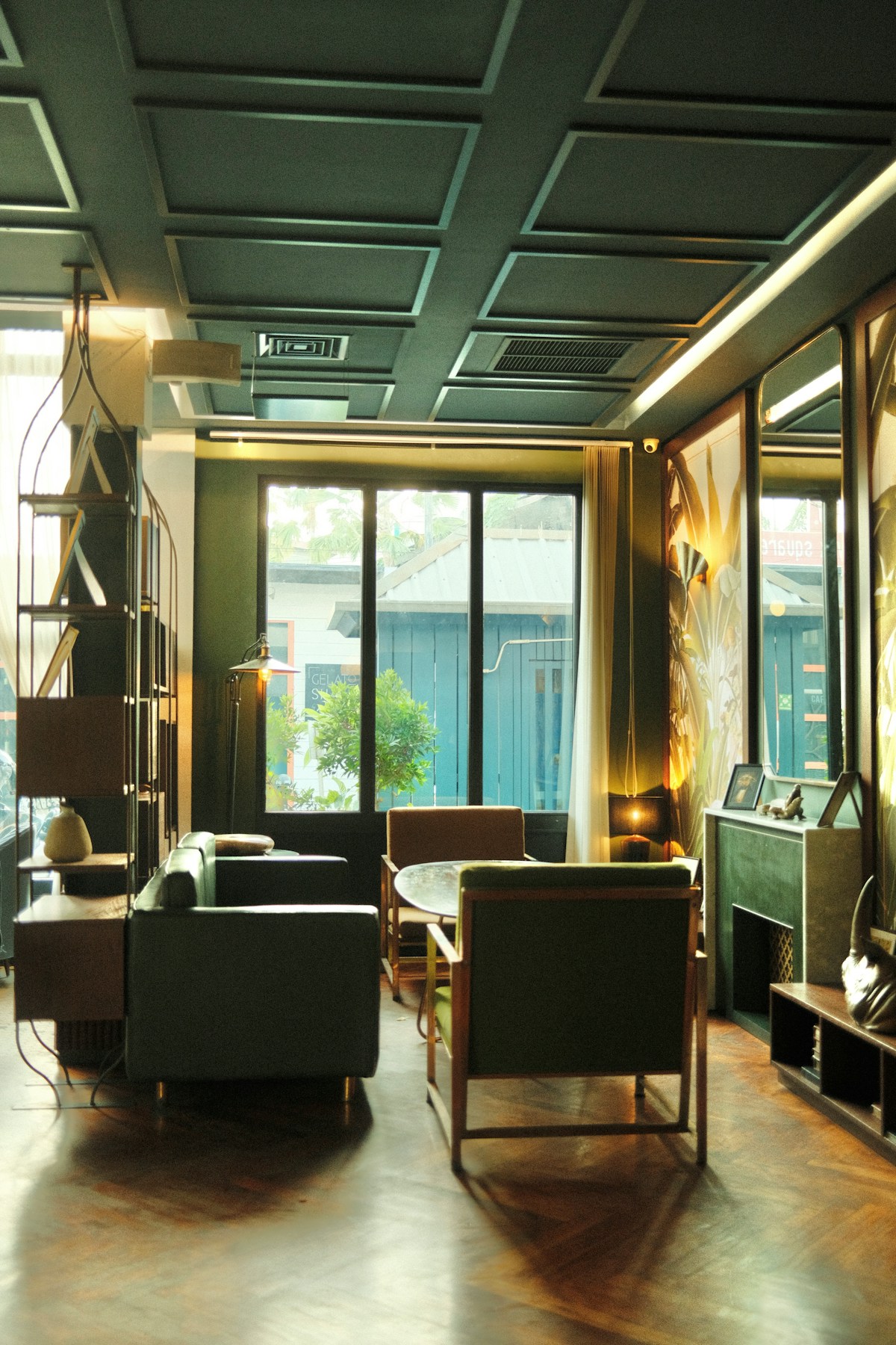 Stylish cafe interior with large windows, Seminyak, Bali, Indonesia