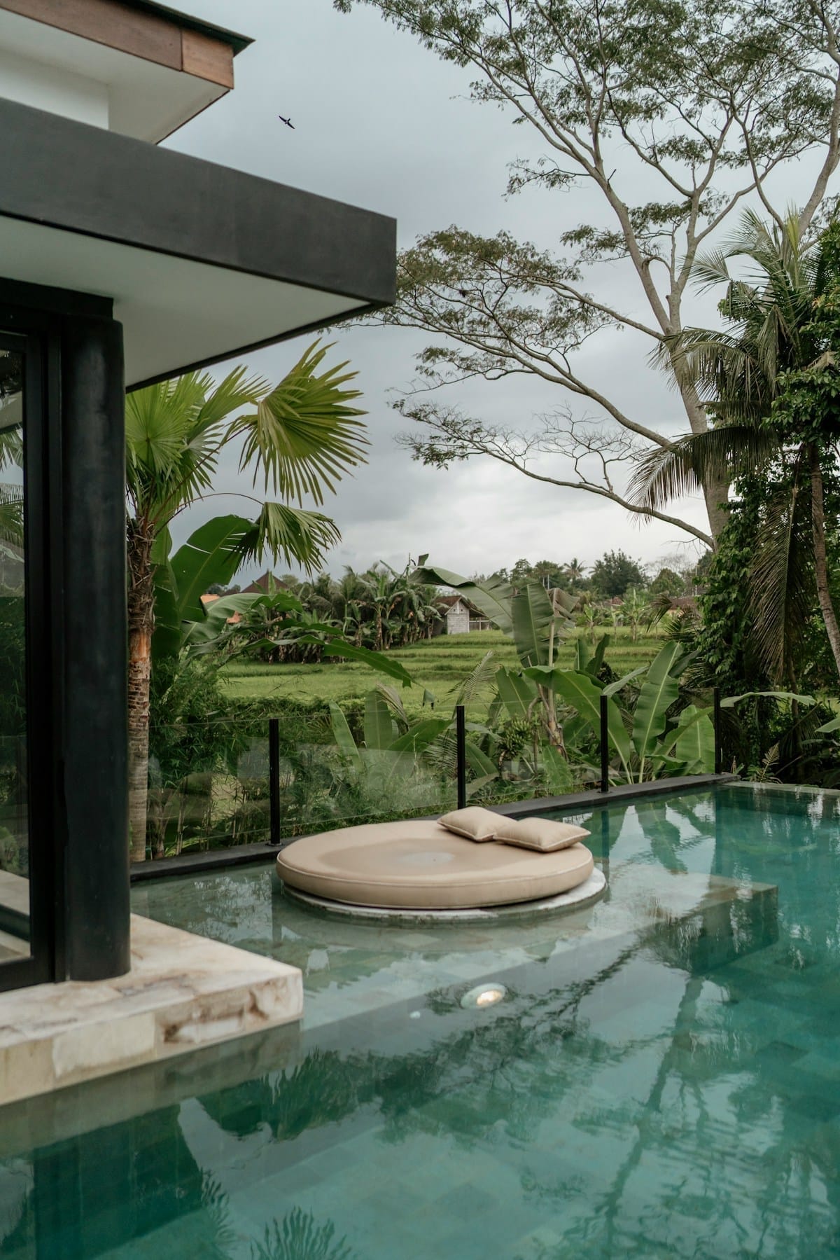 Large pool with lounge chair, Solo, Indonesia