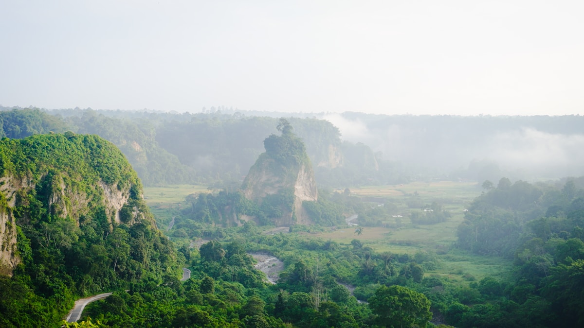 Misty Sianok Canyon valley viewed from Bukittinggi, West Sumatra, Indonesia