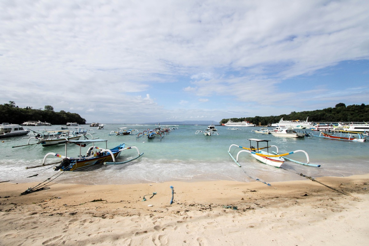 Aerial view of Gili Trawangan with clear turquoise water and white sand beach